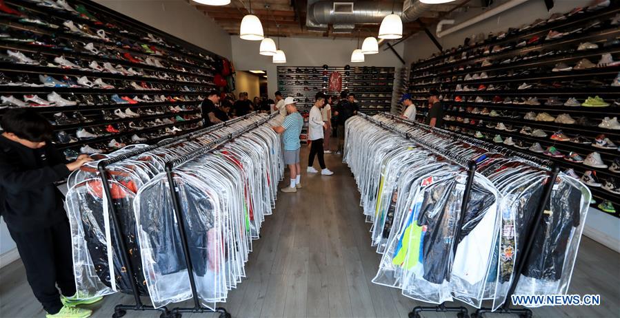 Streetwear shop owner hopes to be link between Chinese American