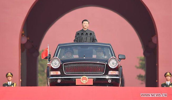 Xi Focus: President Xi reviews armed forces on National Day for first time